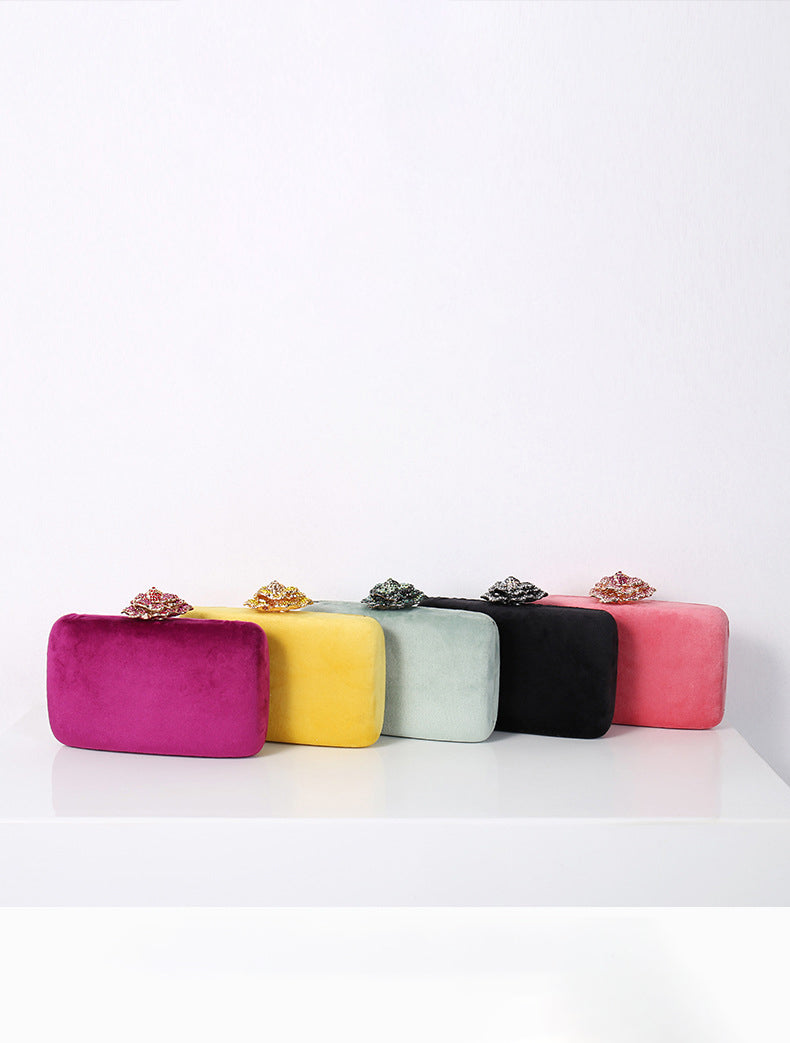 Suede evening clutch with chain strap