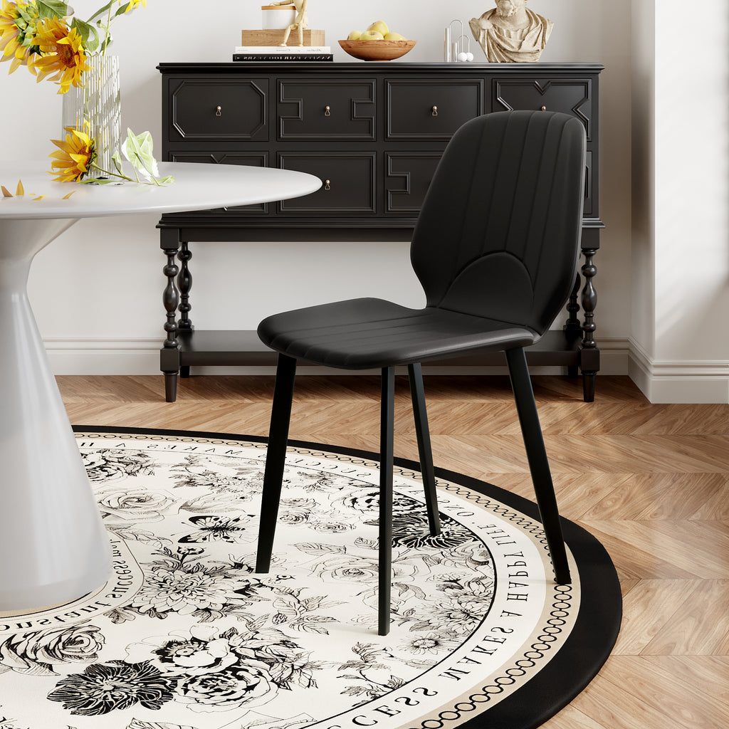 Black dining chairs at a table