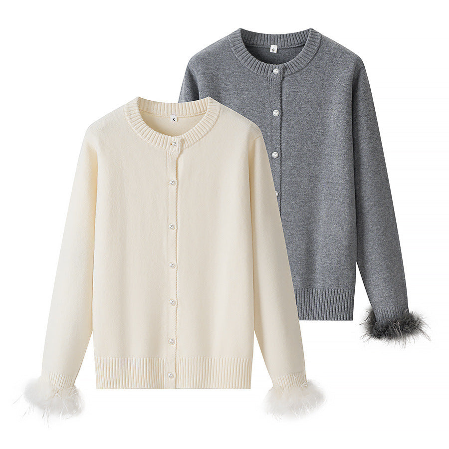 Feather decorated round neck loose knit cardigan
