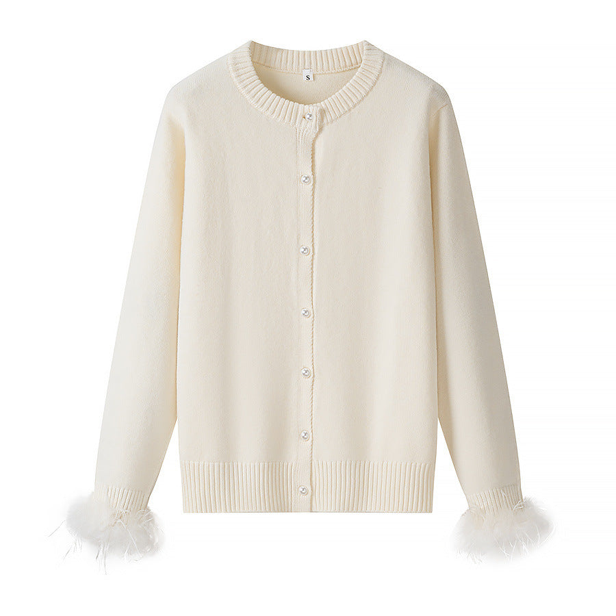 Feather decorated round neck loose knit cardigan