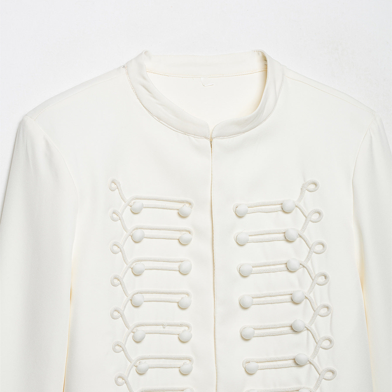 Stand up collar with shoulder pads long sleeved short jacket
