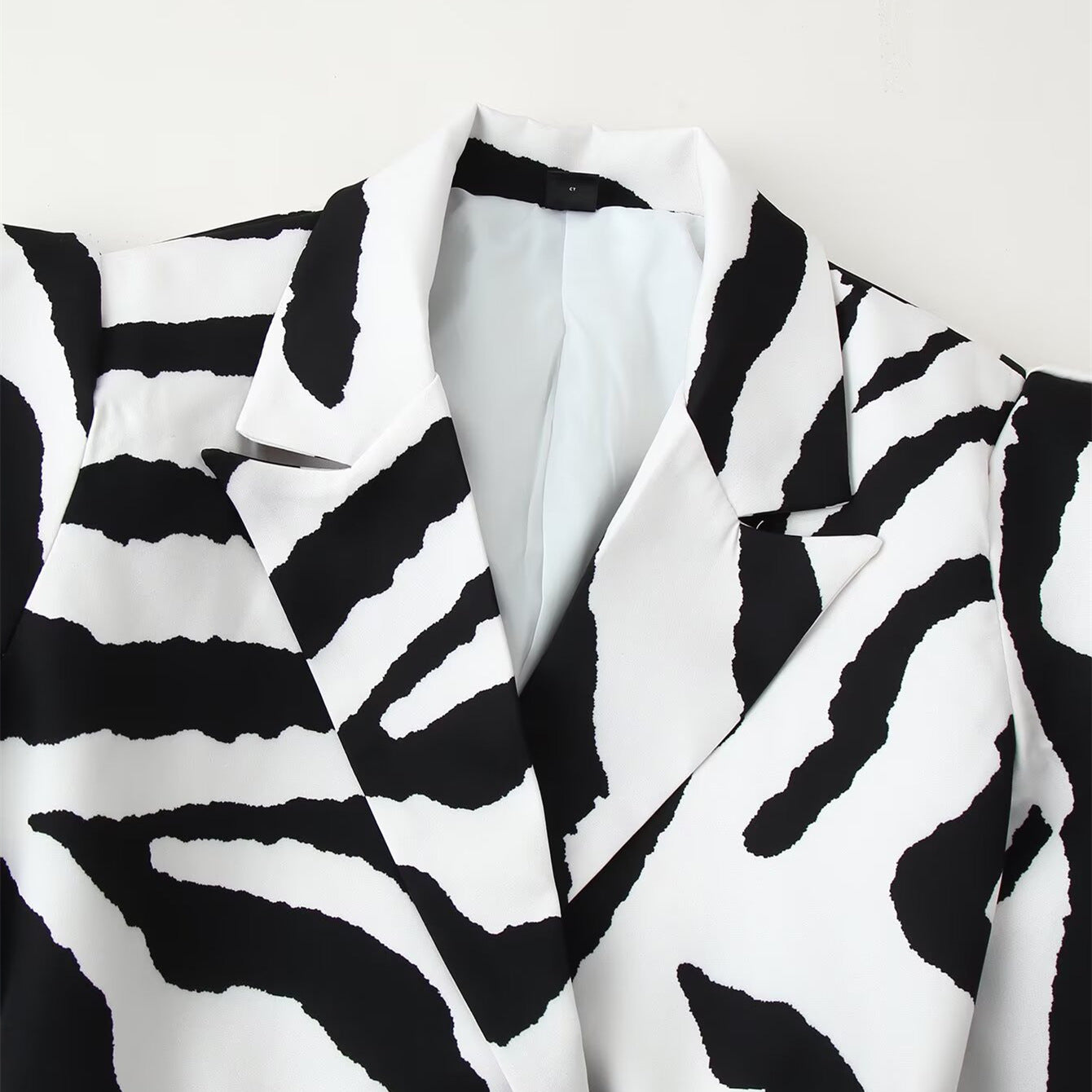 Zebra stripe waist cinching lace up wide shoulder suit jacket