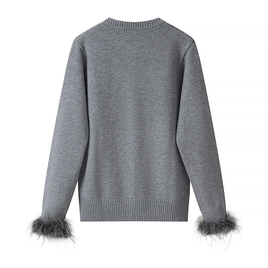 Feather decorated round neck loose knit cardigan