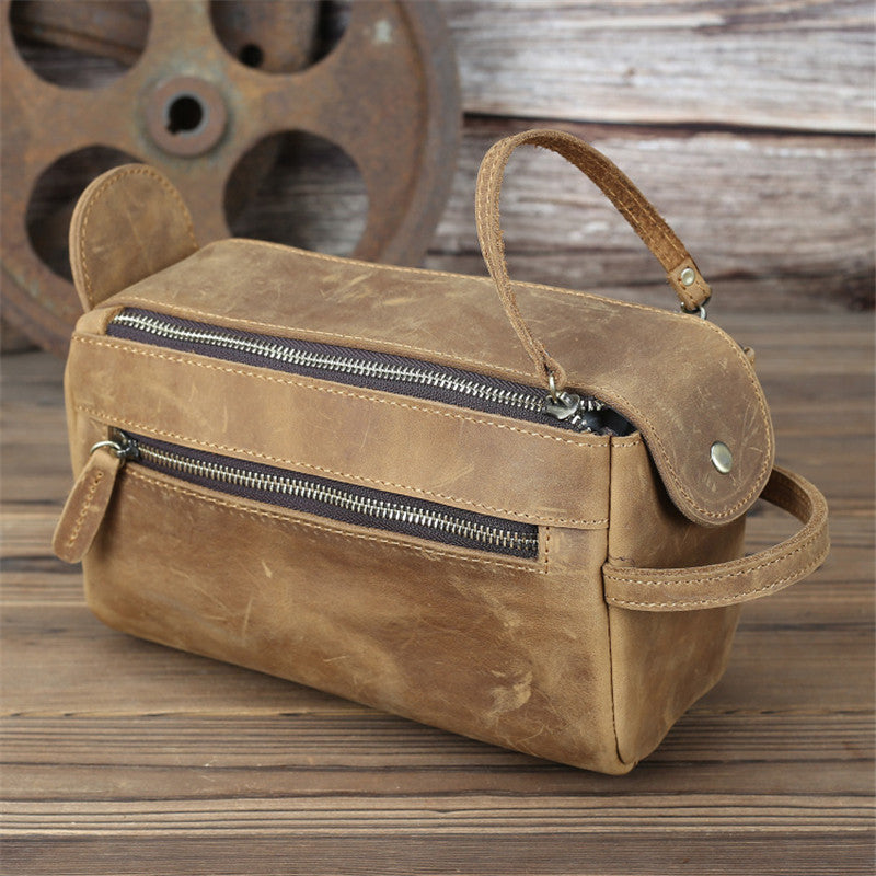 Women's leather handbag with belt detail
