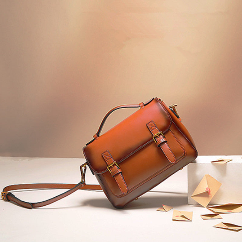 Women's cowhide messenger handbag